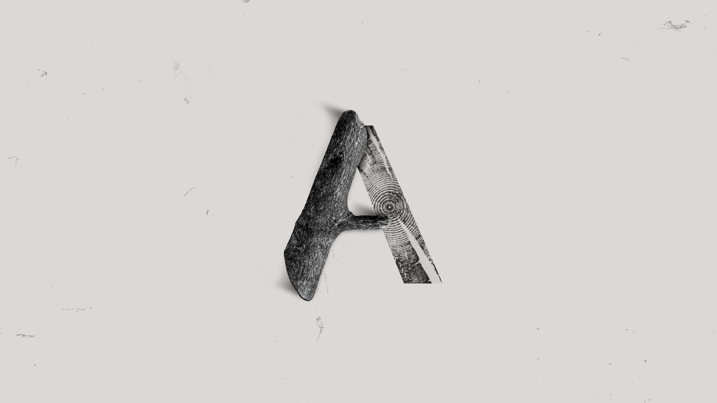 Arbolera — letra A formada por un tronco y su corte